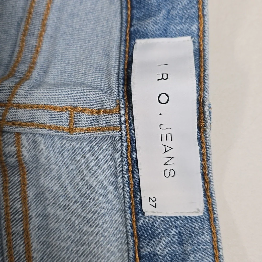 IRO • Genn Light Wash Distressed Chain Skinny Jeans